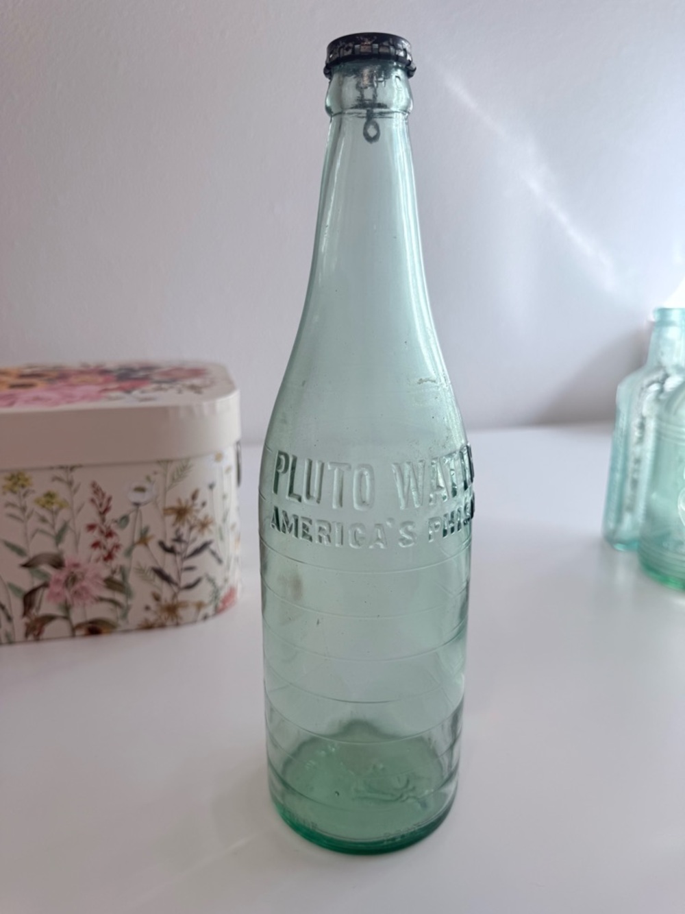 🐣5/$25-Pluto Water Vintage Aqua Glass Bottle - Embossed Logo